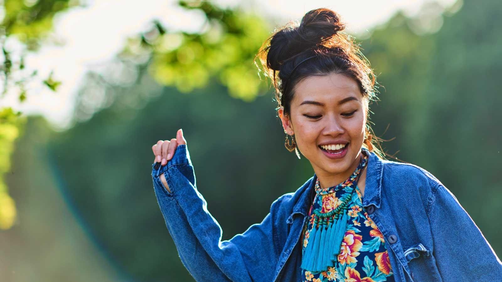 lady dancing and smiling