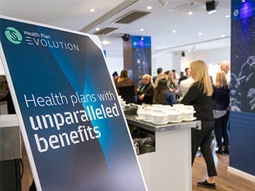 A poster board advertising Simplyhealth's health plan Evolution