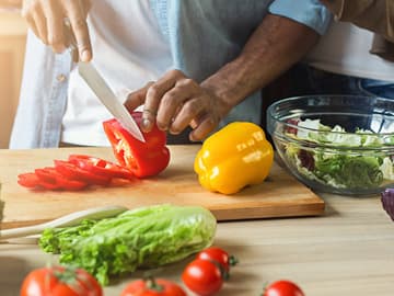 Preparing vegetables for salad