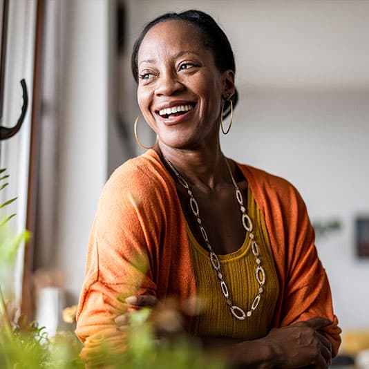 Lady smiling out window